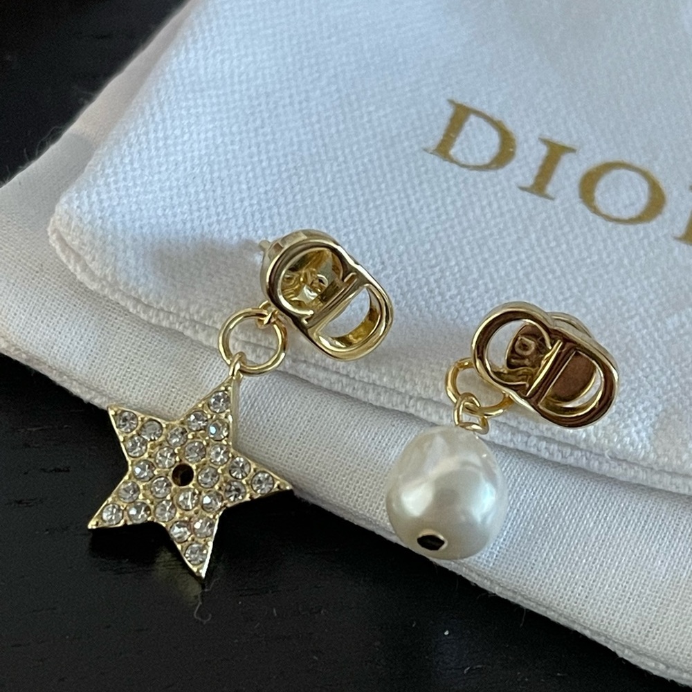 Womens Dior pearl and star charm earrings